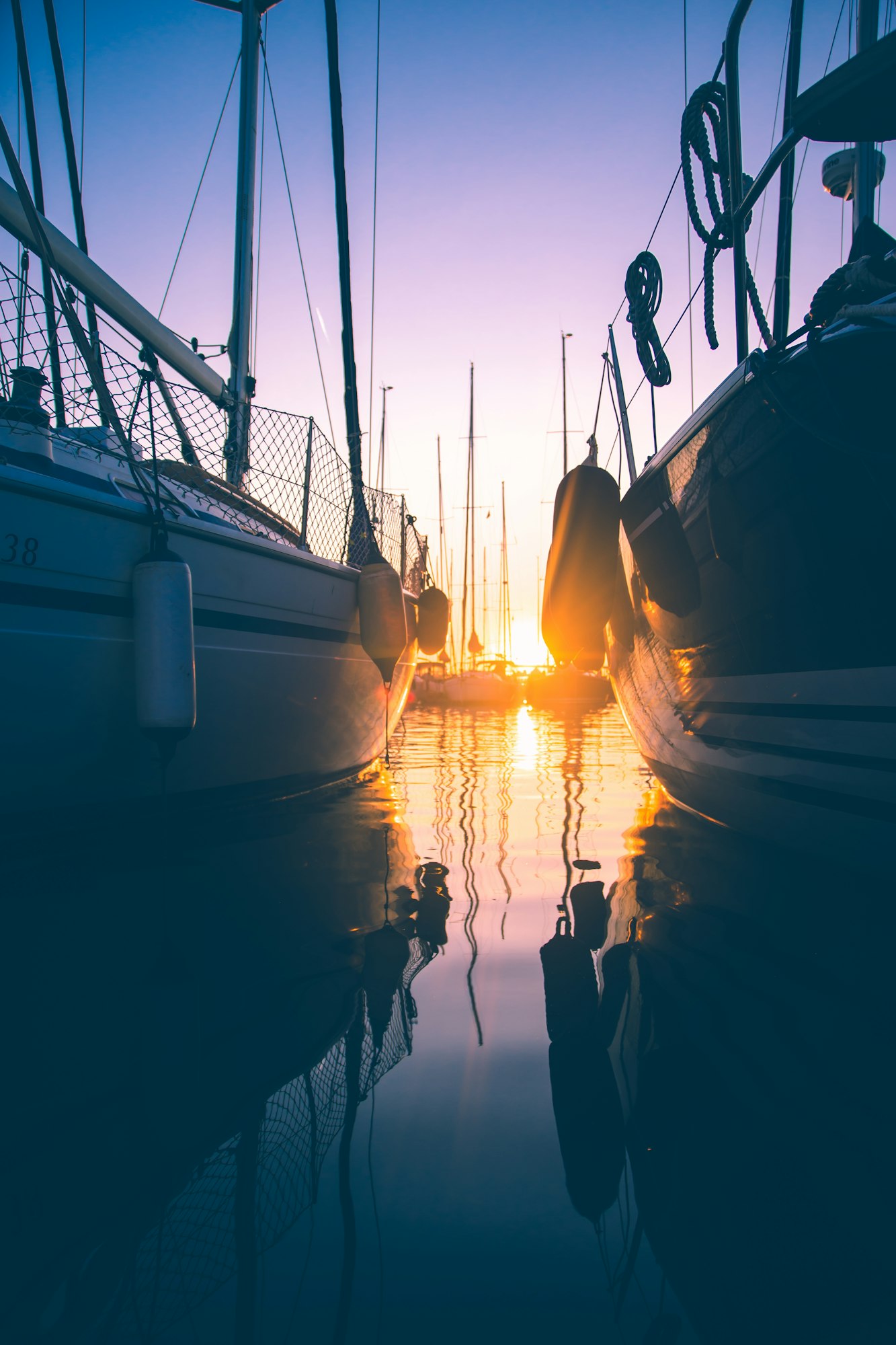 Colorful sunset harbor yacht sailboat water sky night background space for copy